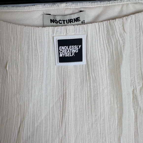 High-Waisted Flare Pants - Picture 4 of 10